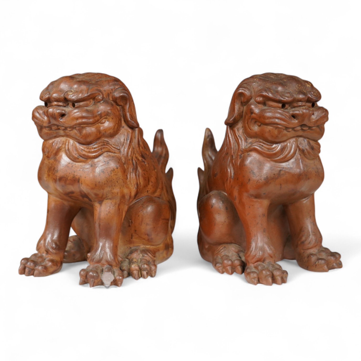 A pair of Japanese Bizan ware lion dogs (shi shi), 18cm high